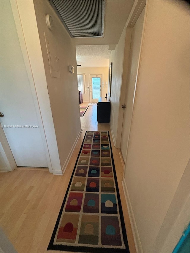 hallway featuring light hardwood / wood-style flooring