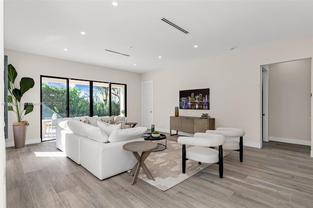 living room featuring light hardwood / wood-style flooring