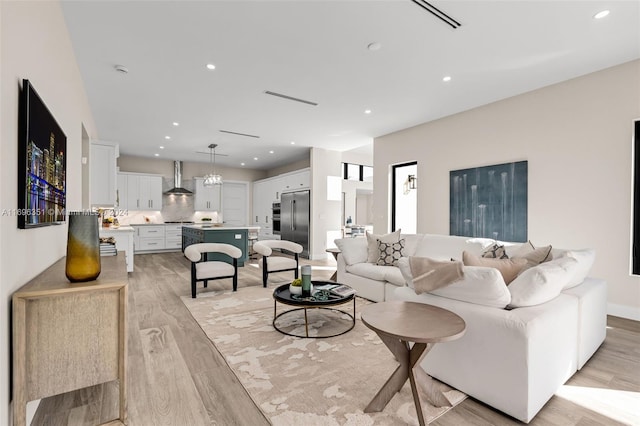 living room with light hardwood / wood-style flooring