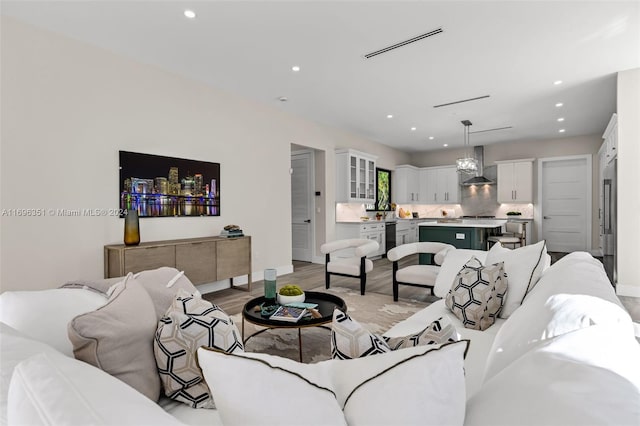 living room with light hardwood / wood-style floors