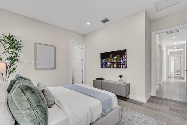 bedroom featuring light hardwood / wood-style flooring