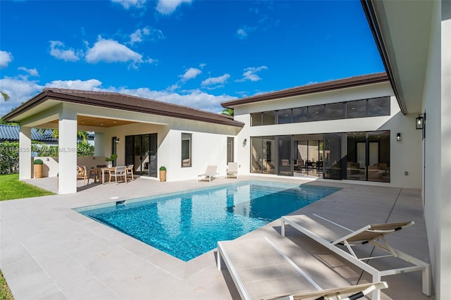 rear view of house featuring a patio area