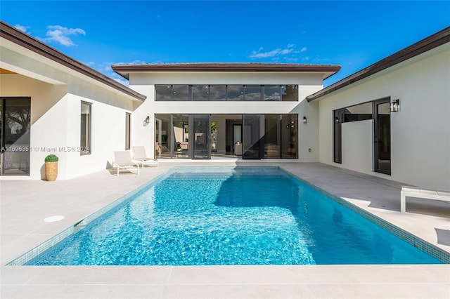 back of house featuring a patio