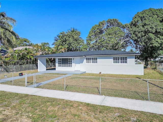 single story home with a front yard