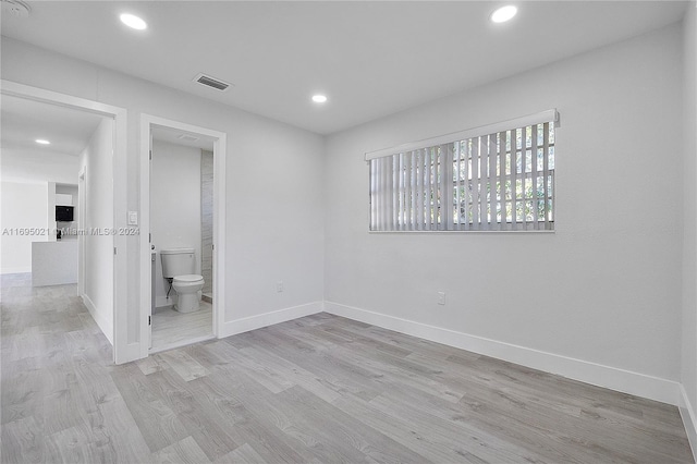 empty room featuring light hardwood / wood-style flooring