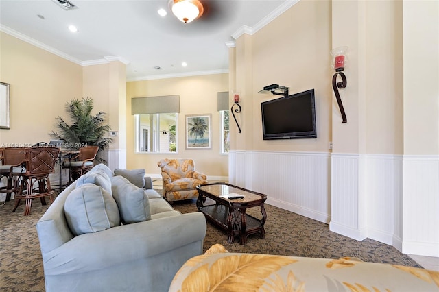 living room featuring dark carpet and ornamental molding