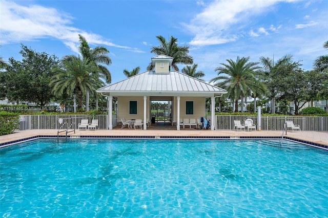 view of swimming pool featuring a patio