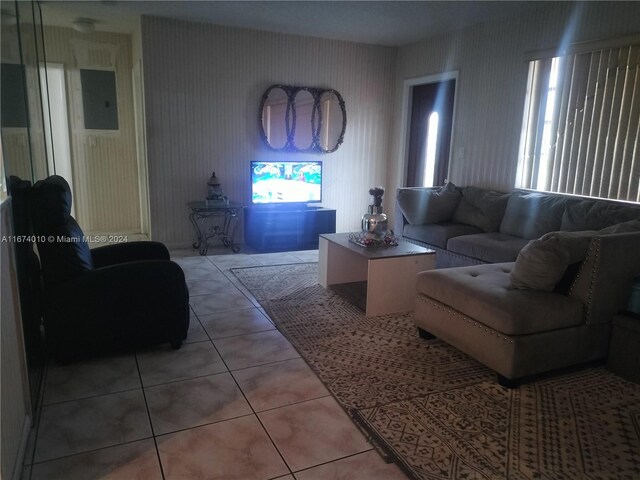 tiled living room featuring electric panel