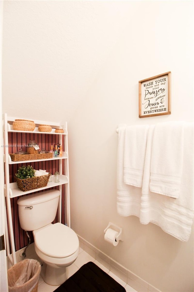 bathroom with tile patterned floors and toilet