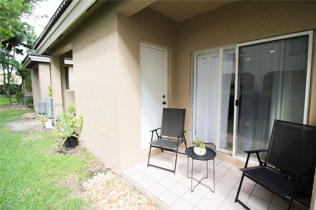 entrance to property featuring a patio