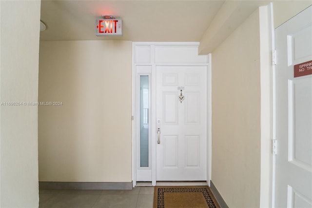 foyer featuring light tile patterned floors