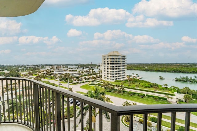 balcony featuring a water view