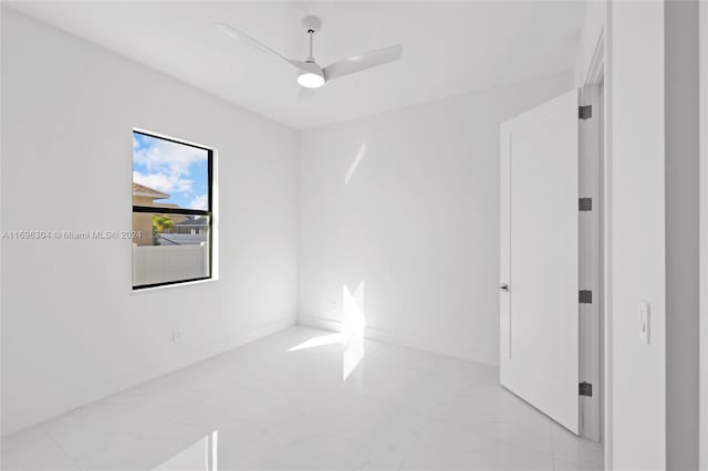 unfurnished room featuring ceiling fan