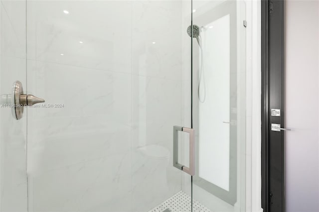 bathroom with an enclosed shower