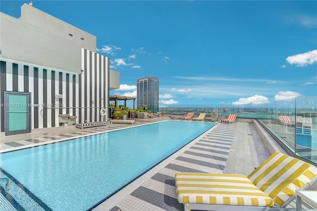 view of swimming pool with a patio