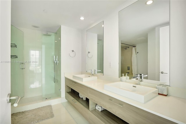 bathroom with vanity, tile patterned floors, and an enclosed shower