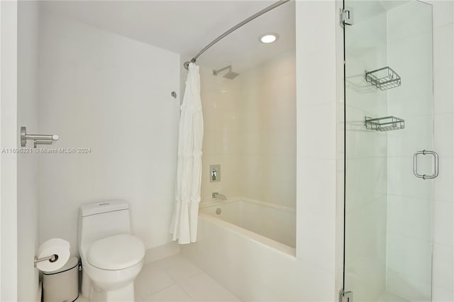 bathroom with tile patterned floors and toilet