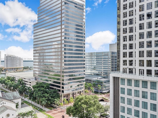 property's view of city featuring a water view