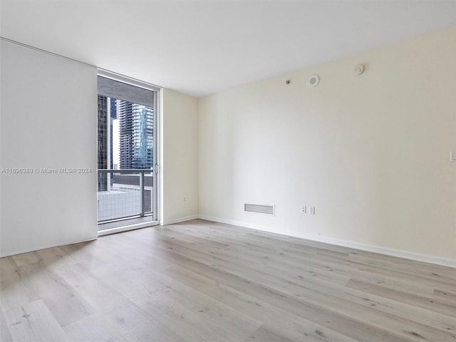 empty room featuring light wood-type flooring