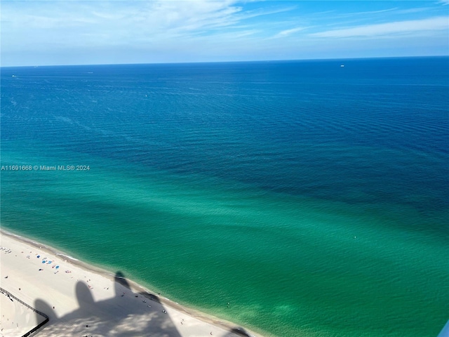 view of water feature with a beach view