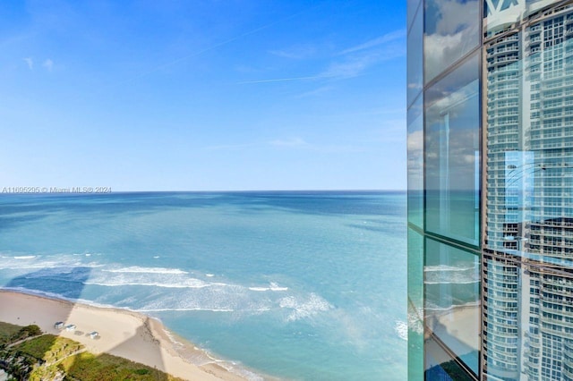 property view of water featuring a beach view