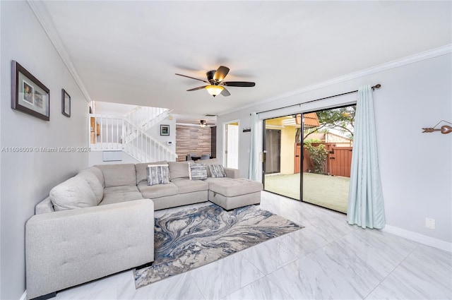 living room featuring ceiling fan and crown molding