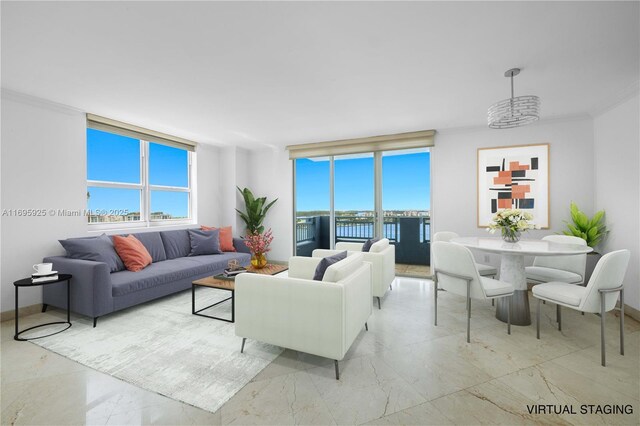 90 Alton Rd Unit 1902, Miami Beach, FL 33139 - living area featuring marble finish floors, crown molding, a chandelier, and baseboards