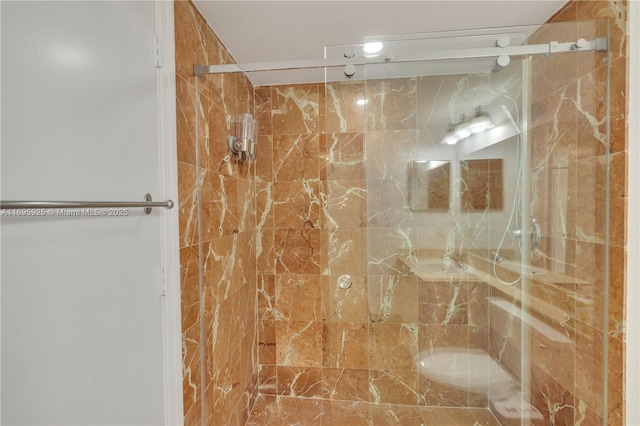 bathroom featuring an enclosed shower