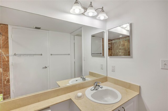 bathroom featuring vanity and walk in shower