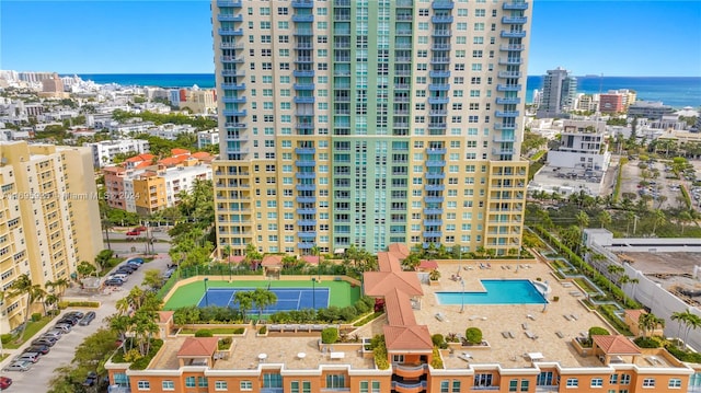 birds eye view of property featuring a water view