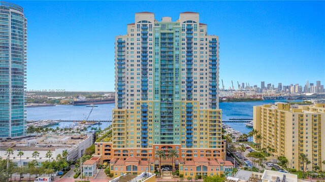 90 Alton Rd Unit 1902, Miami Beach, FL 33139 - view of property featuring a view of skyline and a water view