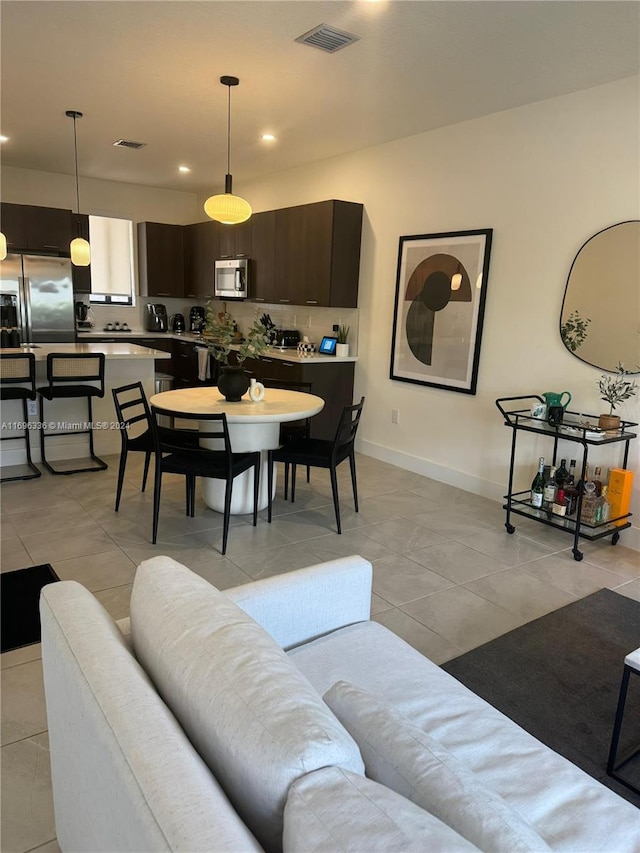 living room featuring light tile patterned flooring