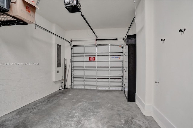 garage featuring electric panel and a garage door opener