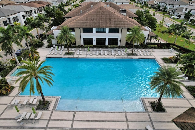 view of swimming pool featuring a patio area