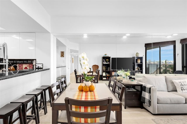 dining area with light tile patterned flooring