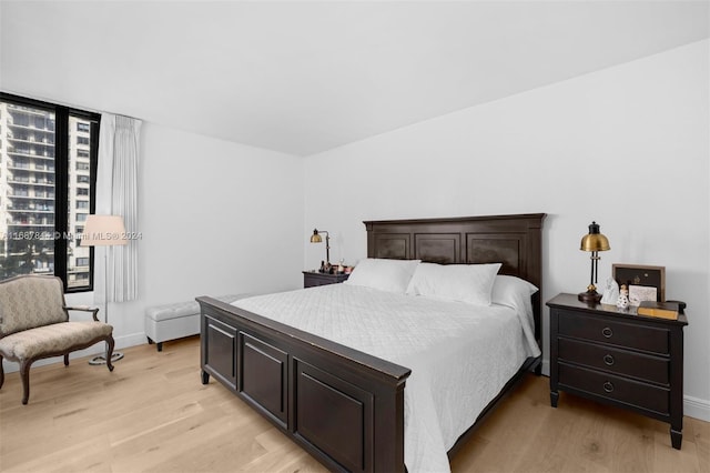 bedroom featuring light wood-type flooring