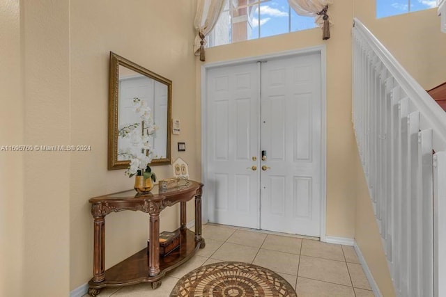 view of tiled foyer entrance