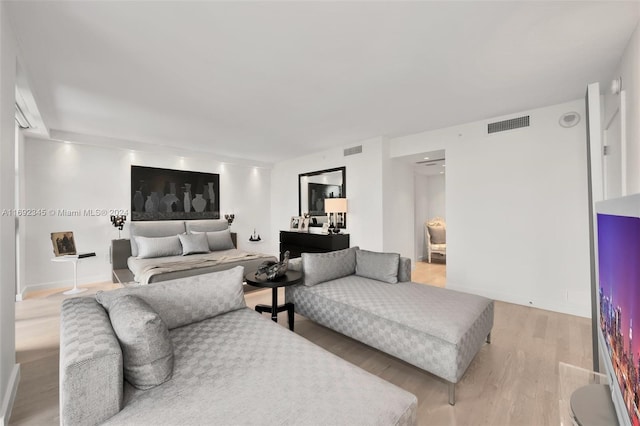 bedroom featuring light hardwood / wood-style floors