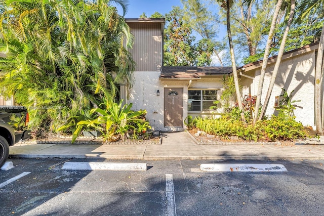 7243 W Sunrise Blvd Unit 7243K, Plantation, FL 33313 - view of front of property with uncovered parking and stucco siding