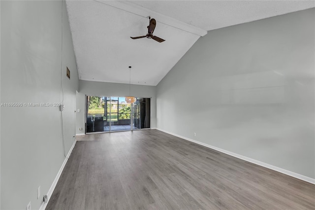 unfurnished living room featuring a textured ceiling, ceiling fan, beam ceiling, hardwood / wood-style flooring, and high vaulted ceiling