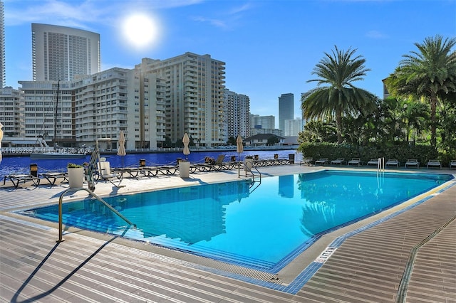 view of swimming pool featuring a patio area