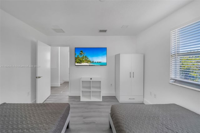 bedroom featuring light wood-type flooring