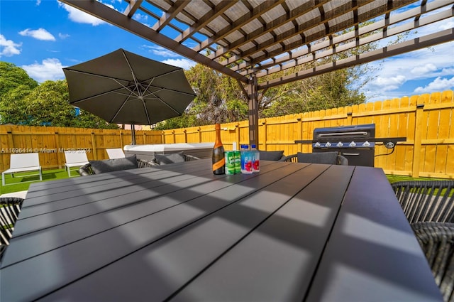 view of patio / terrace featuring a pergola and a grill