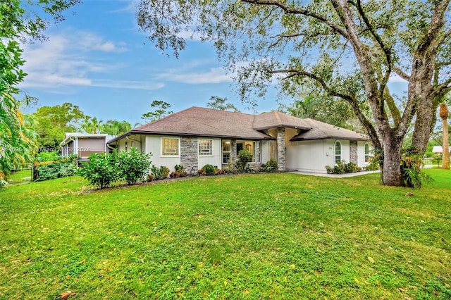 ranch-style house with a front lawn