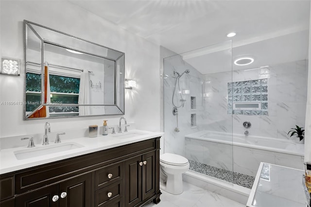 bathroom featuring vanity and tiled shower / bath