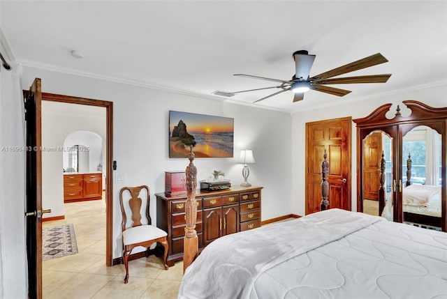 tiled bedroom featuring ornamental molding, french doors, and ceiling fan