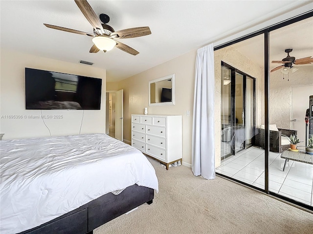 bedroom featuring ceiling fan and light carpet