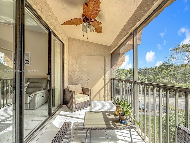 balcony featuring ceiling fan