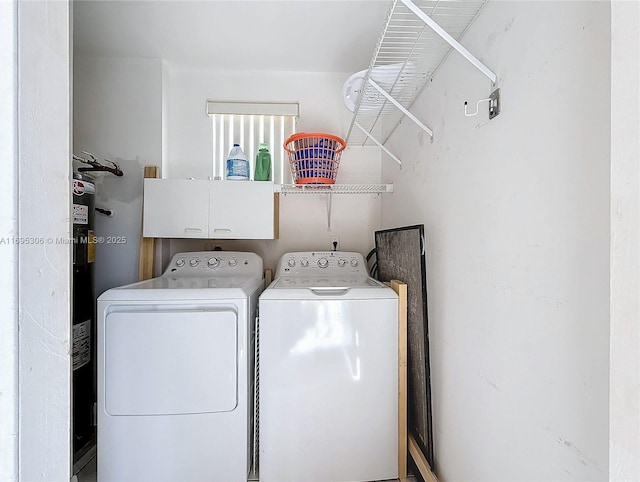 laundry room featuring separate washer and dryer