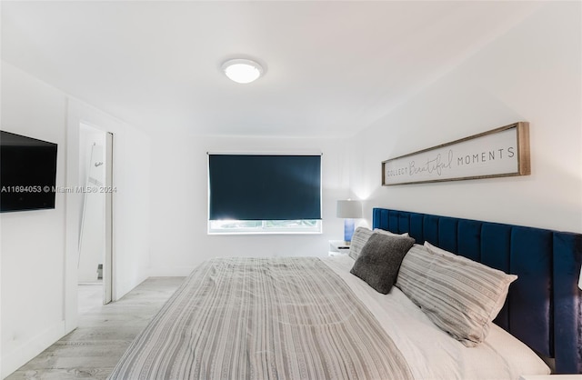 bedroom featuring light hardwood / wood-style flooring